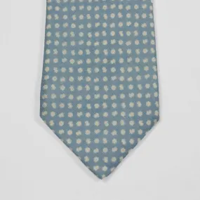 Light blue linen tie, white hand-printed flower motifs, self-tipped