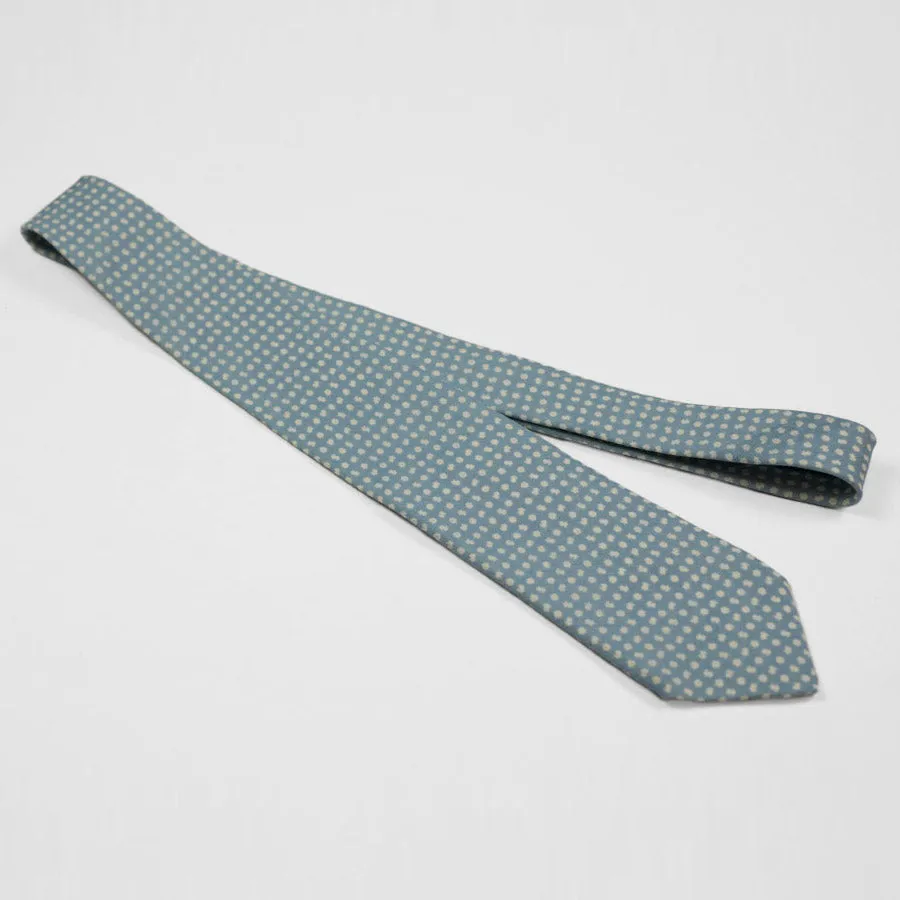 Light blue linen tie, white hand-printed flower motifs, self-tipped