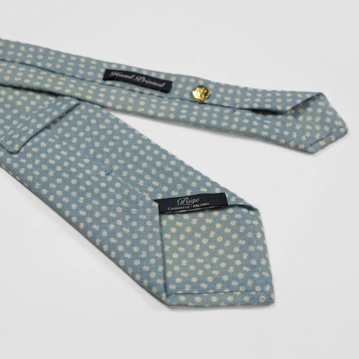 Light blue linen tie, white hand-printed flower motifs, self-tipped
