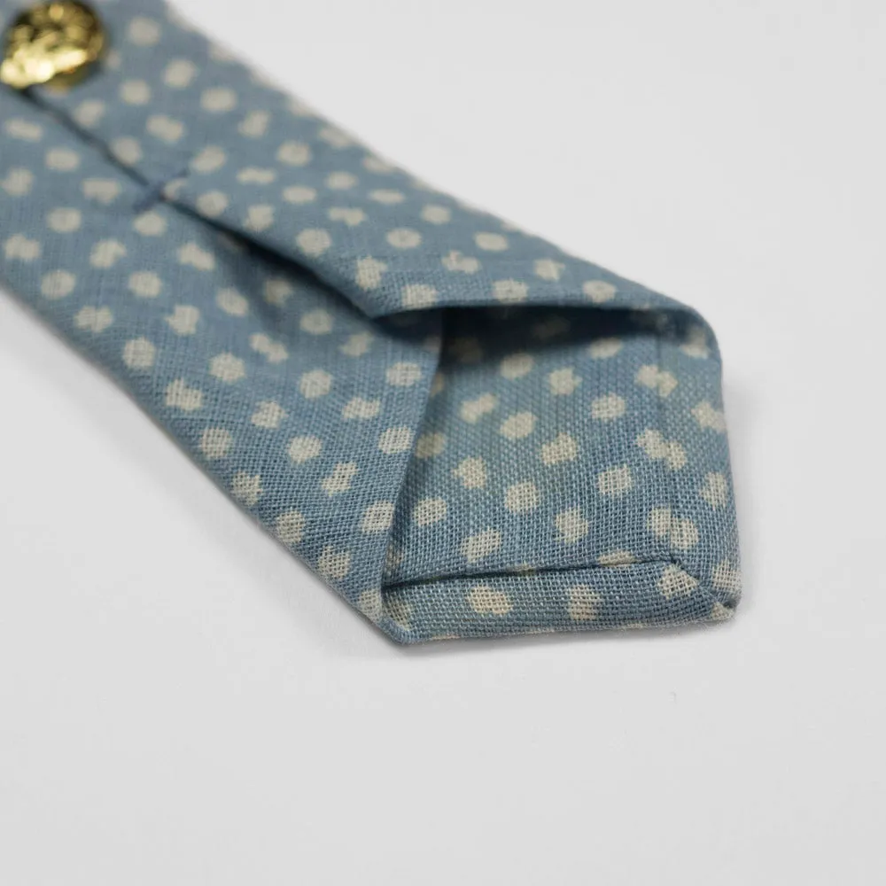 Light blue linen tie, white hand-printed flower motifs, self-tipped