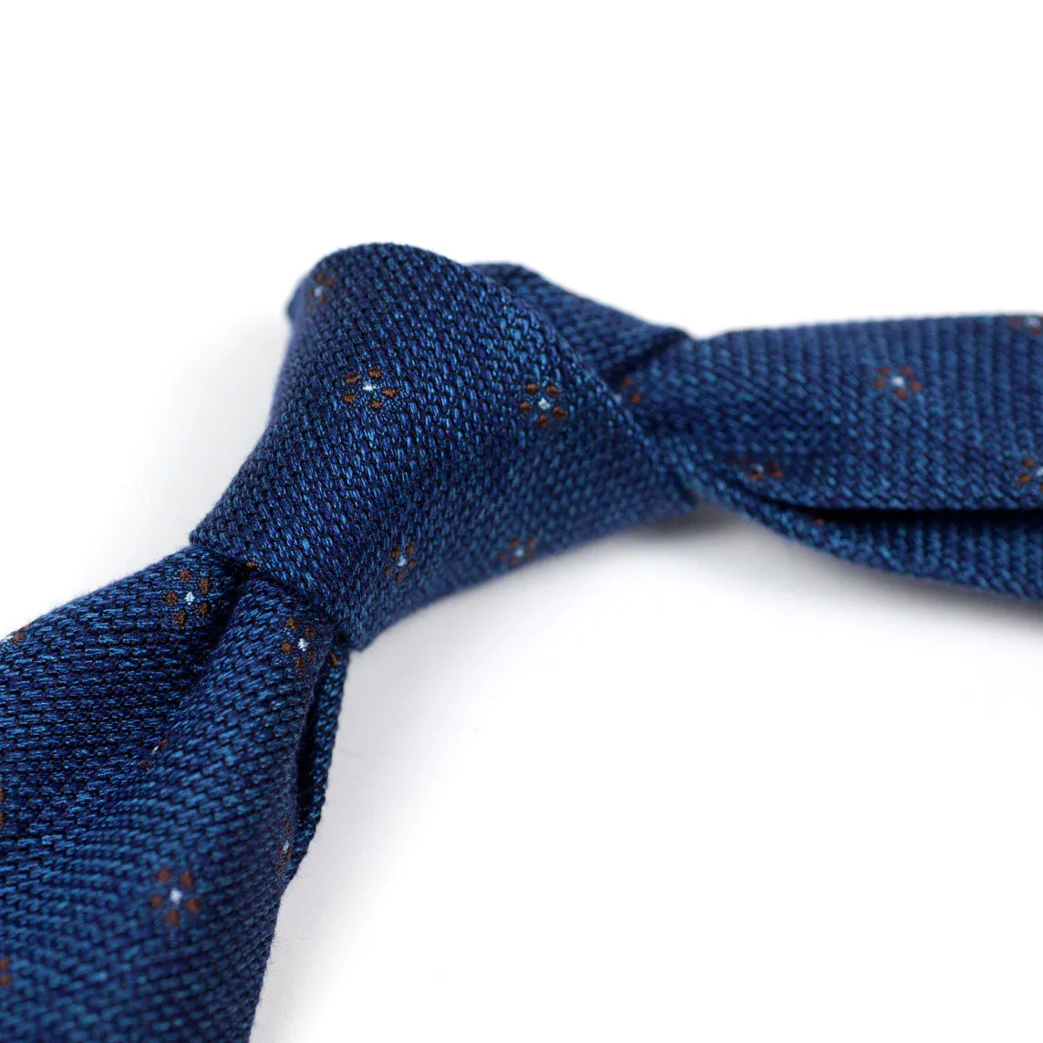 Marled blue coarsely woven silk tie, brown flower motifs